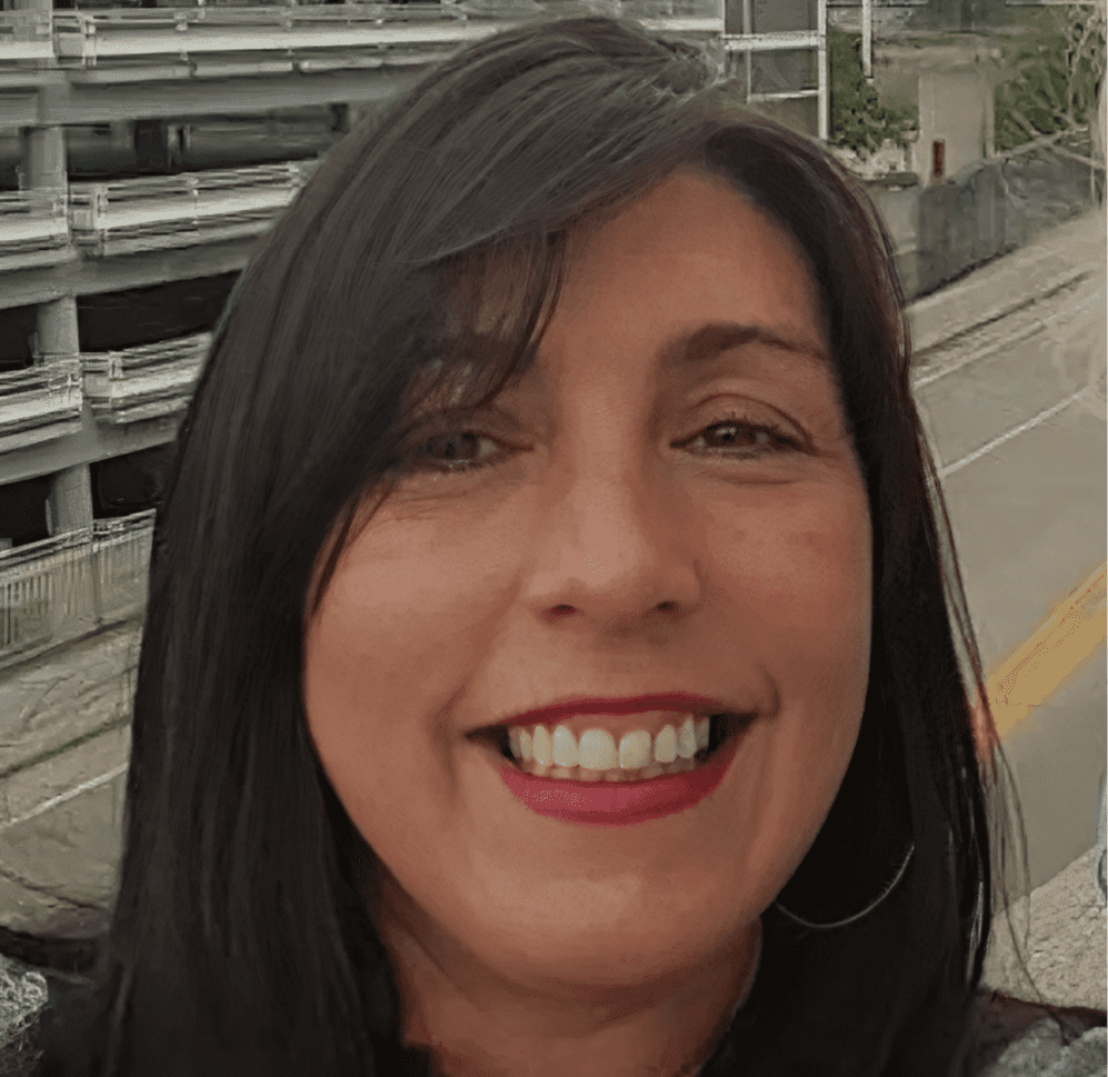 Close-up of woman smiling brightly