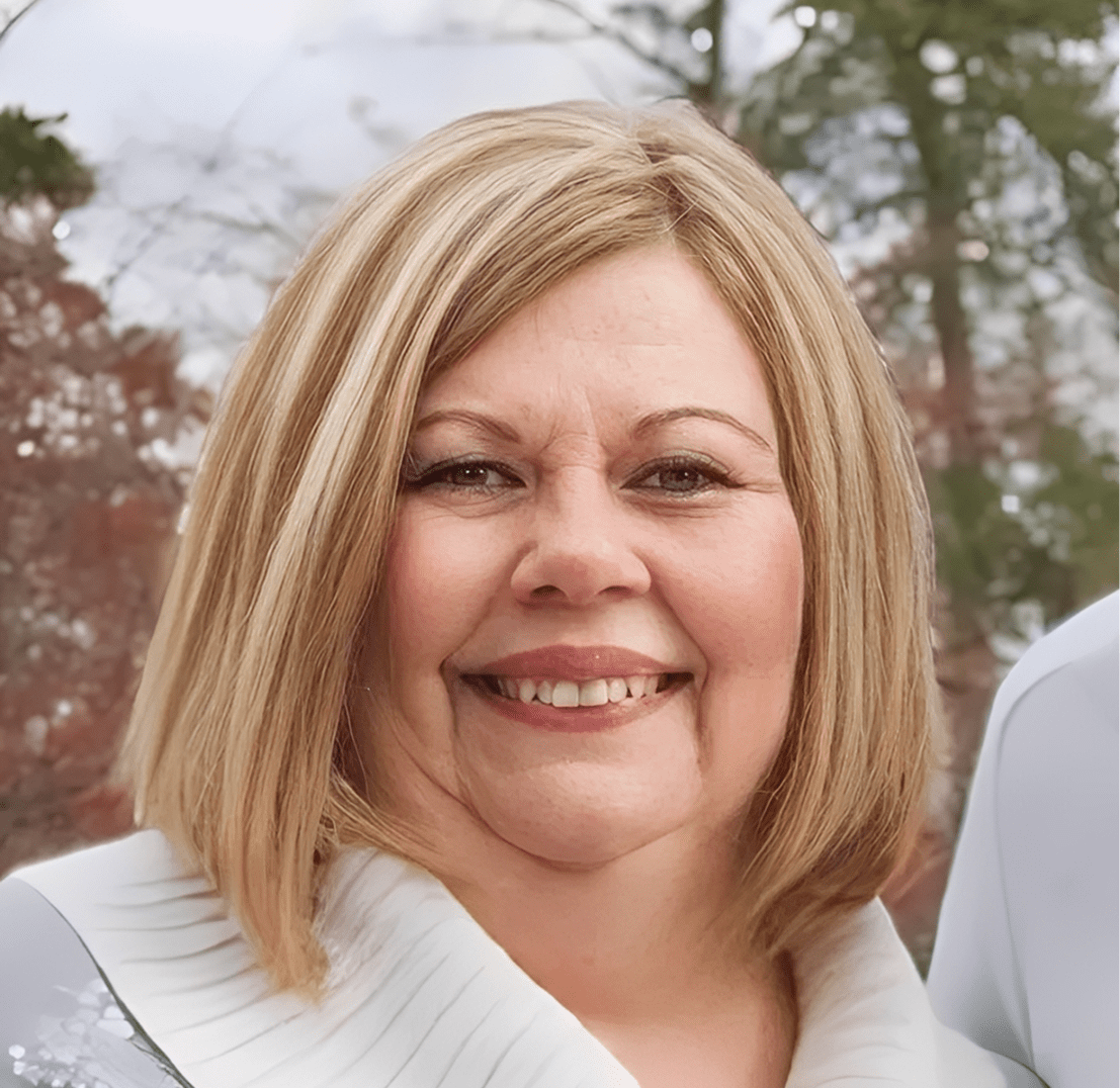 Cheerful lady in white sweater outside